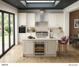Modern kitchen with white cabinets, an island with built-in wine cooler, stainless steel appliances, large windows framing views like white clouds, a skylight, and wooden floor.