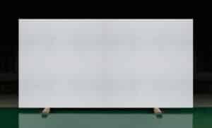 Salt speckled white mineral surface slab