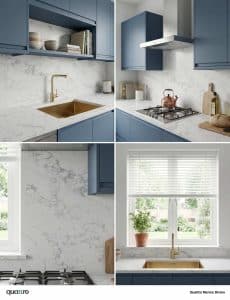Modern kitchen with blue cabinets, Marmo Divino marble-patterned countertops and backsplash, gold faucet and sink, gas stove, and window with white blinds overlooking a garden.